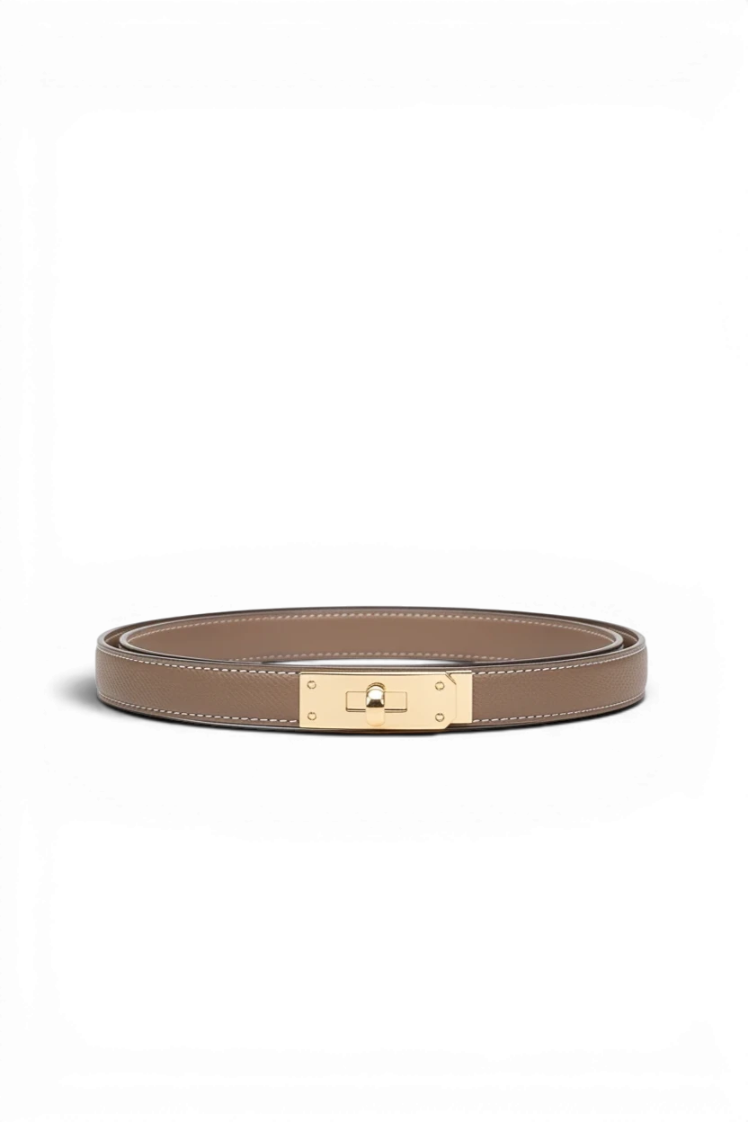 Meraki Closet PS taupe leather belt with gold-tone metal clasp closure and white contrast stitching.
